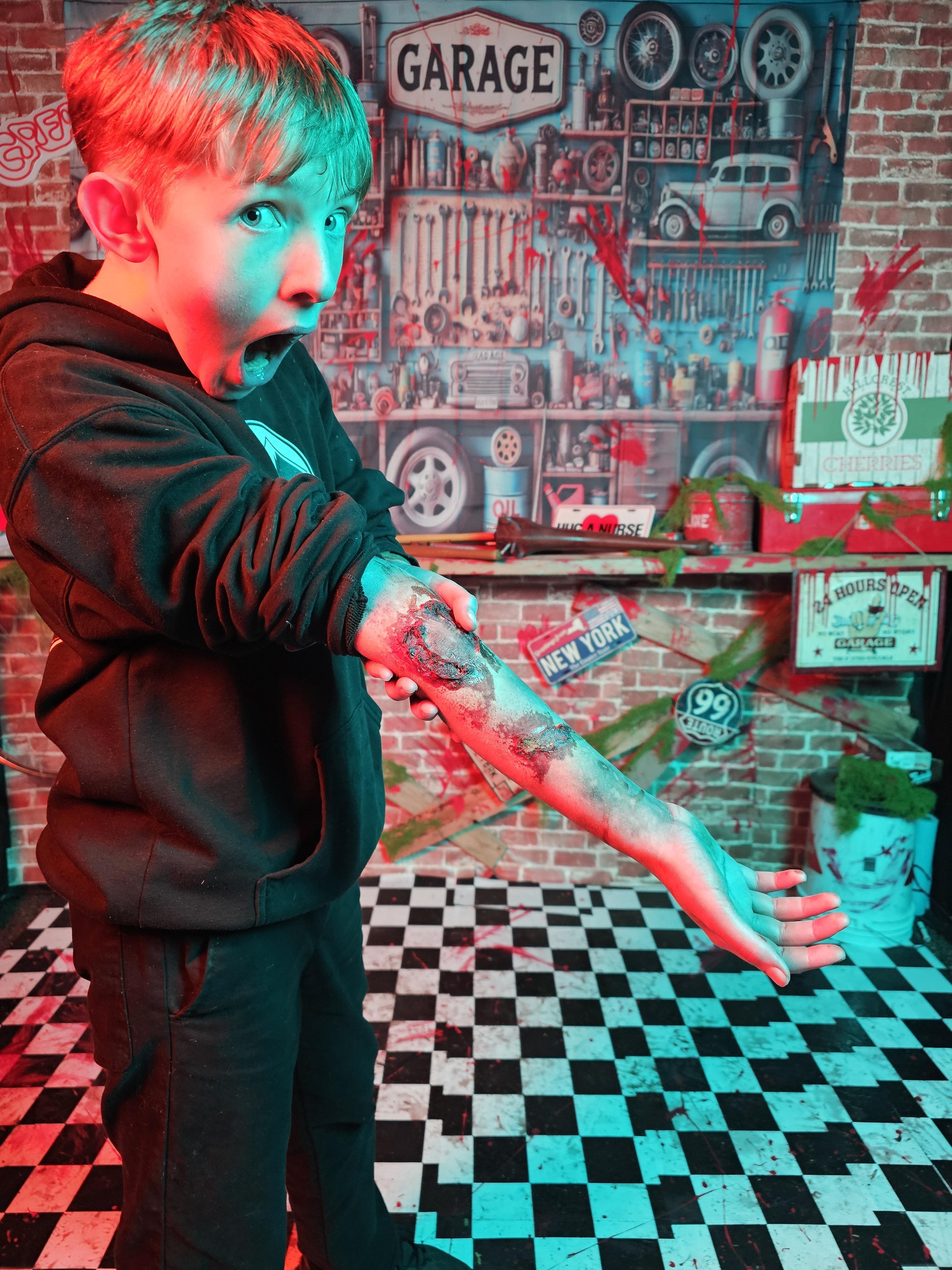 An actor rehearsing a scare in the garage scene